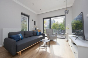 Air Conditioned Apartment with Furnished Garden in Warsaw Center by Renters Prestige